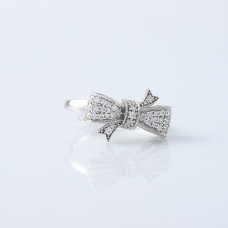 Round Cut Moissanite Diamond Bow Tie Ring in 18K White Gold