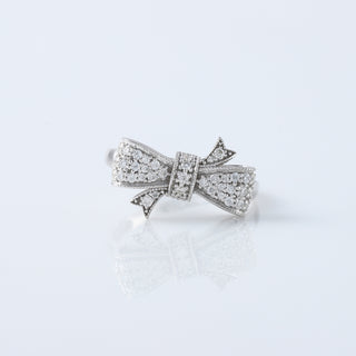 Round Cut Moissanite Diamond Bow Tie Ring in 18K White Gold